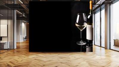 Glasses and bottles with red and white wine on black background Wall mural