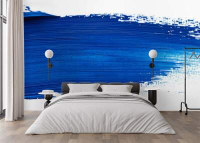 Hand painted stroke of blue paint brush isolated on white background Wall mural