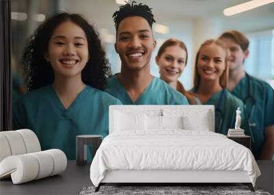 Happy medical team, a group of student nurses and doctors, walk together with smiles on their faces in a teaching hospital. Diverse healthcare students starting their clinical training in scrubs. Wall mural