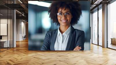 Happy middle aged business afro woman ceo standing in office arms crossed. Smiling mature confident professional executive manager, proud lawyer, businessman leader wearing white suit Wall mural