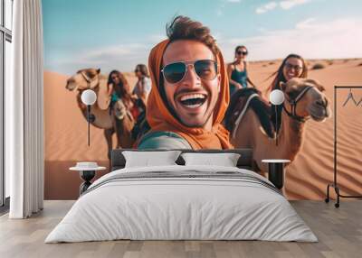 Happy tourist having fun enjoying group camel ride tour in the desert - Travel, life style, vacation activities and adventure concept Wall mural