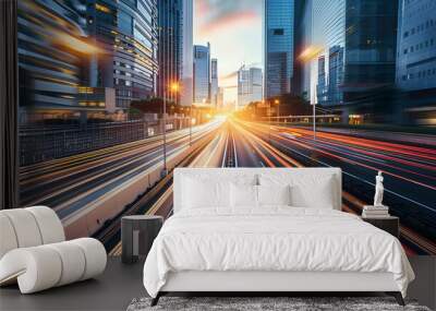 Light flow of traffic on a evening highway in a city with modern high buildings Wall mural