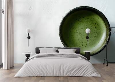 Matcha green tea cup seen from above on a white surface Wall mural