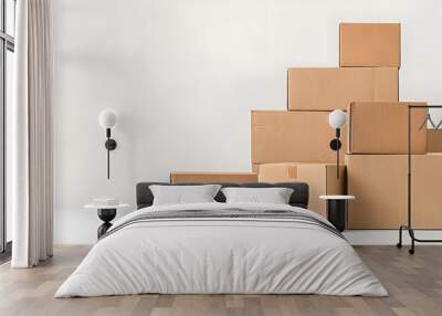 Neatly arranged stack of brown cardboard boxes of different sizes on a clean white background, illustrating the concepts of moving, storage and delivery Wall mural