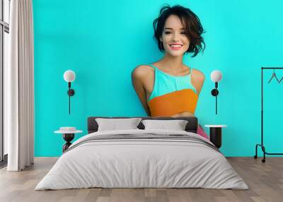 Photo of pretty adorable lady dressed colorful top smiling walking empty space isolated turquoise color background Wall mural