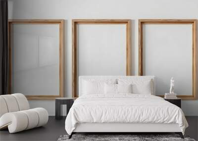 Three large wooden frame mockups in sizes 50x70, 20x28, A3, A4, displayed on a white wall. The frames have a clean, modern, and minimal design, Wall mural