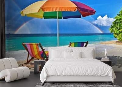 Umbrella, chairs, sea and sand, rainbow, tropical vacation concept Wall mural