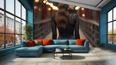 woman wearing an open back black and pantyhose, walkibg away, in the style of voluminous mass, symmetry, princesscore, solapunk, dark gray, multiple styles, hispanicore, back Wall mural