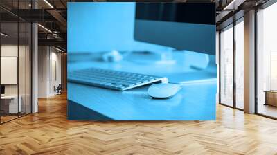 Computer on the work desk in modern office Wall mural