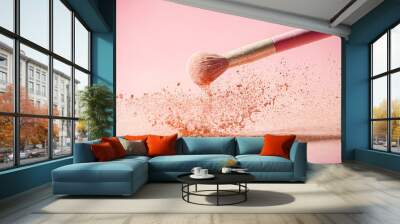 Make up brushes with powder splashes isolated on pink background Wall mural