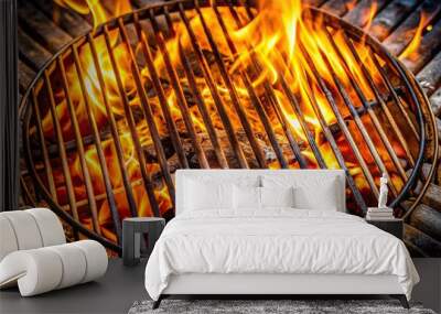 Grill grate with charcoal and flame empty fire grid on black isolated background bird eye view Wall mural