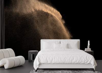 Sand, isolated on black background. Wall mural