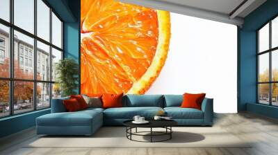 A close-up of a vibrant orange slice against a white background. Wall mural