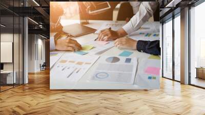 Cropped shot group of businessman meeting on workplace with tablet and paper work. Wall mural