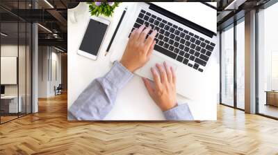 Workspace with business hands working with computer laptop and smartphone, cup of coffee on working table with top view. Wall mural