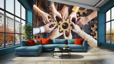 Business teamwork concepts. Many Hand of coworker holding wood gear Wall mural