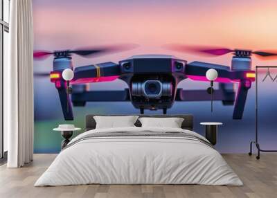 A stunning aerial drone in flight during a colorful sunset, showcasing modern technology and photography capabilities. Wall mural