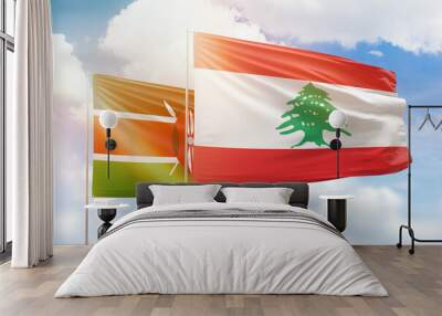 Sunny blue sky and flags of lebanon and kenya Wall mural