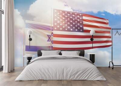 Sunny blue sky and flags of united states of america and israel Wall mural