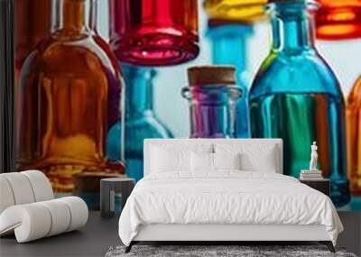 Collection of transparent glass bottles filled with Wall mural