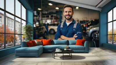 Technician male auto mechanic crossed arms in modern auto repair shop, garage. Wall mural