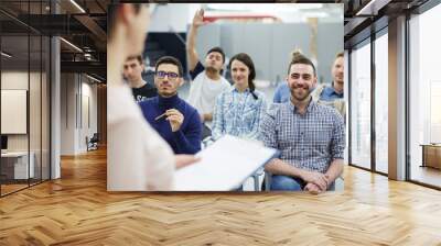 Groupmates listening to lecturer or speaker at conference Wall mural