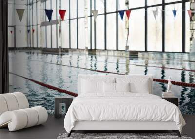 Swimming-pool in contemporary leisure center with water and swimming tracks Wall mural