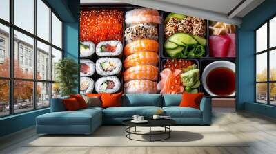 A bento box with tempura shrimp, sushi with fresh tuna and salmon, and  side of pickled ginger Wall mural