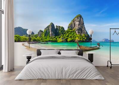 Thai traditional wooden longtail boat and beautiful sand beach. Wall mural