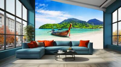 Thai traditional wooden longtail boat and beautiful sand beach. Wall mural