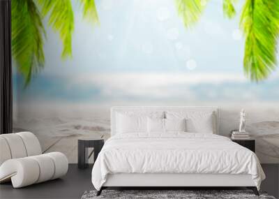 Wooden table top on blue sea and white sand beach background. Wall mural