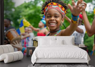 A vibrant Juneteenth kids celebration in a city park, with families and friends gathering for music dance Wall mural