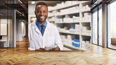 Happy friendly young doctor pharmacist doing inventory and modern pharmacy service while looking at camera with notebook Wall mural