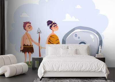 Cave people and wheel isolated concept. Vector flat graphic design illustration Wall mural