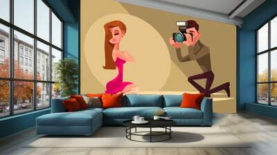 Photographer man character takes photo of model woman. Vector flat cartoon illustration Wall mural