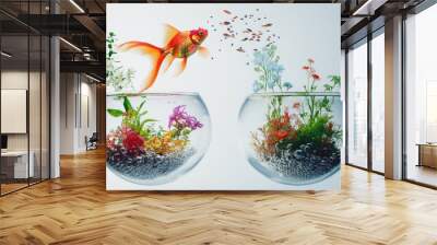 A goldfish leaping from one bowl to another, with the second bowl filled with more colorful plants and decorations, symbolizing progress. Wall mural