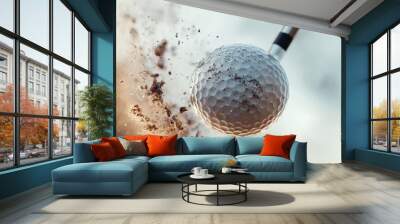 The split second of impact as a golf club strikes a ball, with the ball airborne. Wall mural