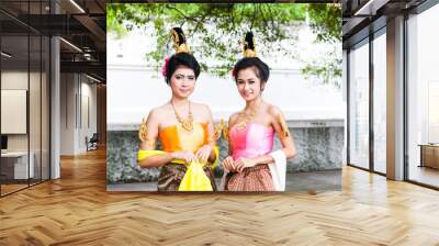 2 beautiful ladies in thai dress Wall mural