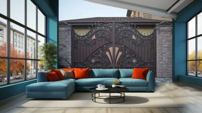 Luxurious metal forged gates and brick fence in a private house Wall mural