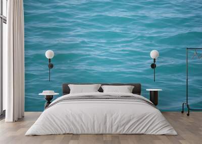 background of blue sea water in sunny weather nature. Wall mural