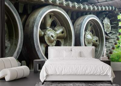 Caterpillars of a tank wheel close up. Wall mural