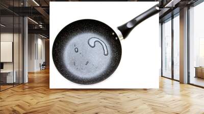 Frying pan with drops of water on an isolated white background. Wall mural