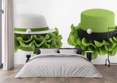 Top view of fresh green lettuce heads creatively arranged and styled as different types of hats, all neatly displayed on a transparent background. Wall mural