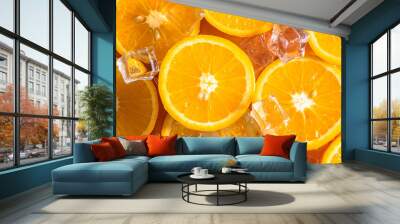 Orange slices and ice cubes with sparkling juice, fresh fruit lemonade with sparkling water and ice cubes, summer lemonade orange drink. Flat lay, top view Wall mural