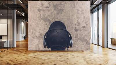 back of asian teenager with headphone listening music on grunge texture cement wall background Wall mural