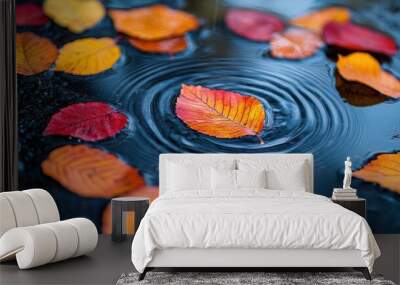 autumn scene with vibrant red, orange, and yellow leaves on a wet surface, reflecting in a puddle on a rainy day. Serene, meditative.  perfect for fall and nature background Wall mural