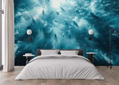 Blue underwater background featuring a large shoal of fish swimming together in harmony. Perfect for ocean life, marine wildlife, underwater scenes, and aquatic Wall mural