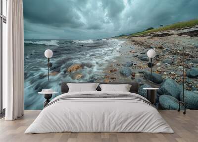 rocky shore in New England with waves crashing against weathered stones. The scene captures the raw, natural beauty of the region's coastline Wall mural