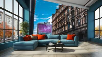 A view of a Glasgow street in front of a tall building Wall mural