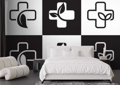 plus with leaf logo, health care symbol icon design. Wall mural